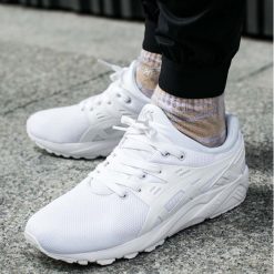 Buty Asics Gel-Kayano Trainer Evo "White" (H707N-0101). Białe buty sportowe męskie marki Asics, z materiału, asics gel kayano. Za 194,99 zł.