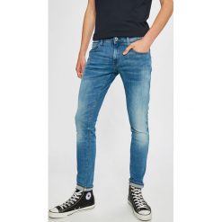 G-Star Raw - Jeansy Deconstructed. Niebieskie jeansy męskie G-Star RAW, l, bez wzorów, retro, z obniżonym stanem. W wyprzedaży za 299,90 zł.