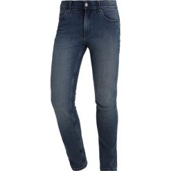 Cheap Monday TIGHT Jeans Skinny Fit steel. Niebieskie rurki męskie marki Cheap Monday. W wyprzedaży za 146,30 zł.