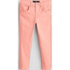 Mango Kids - Jeansy dziecięce Patri 122-164 cm. Białe jeansy dziewczęce Mango Kids, bez wzorów, z elastanu. W wyprzedaży za 59,90 zł.