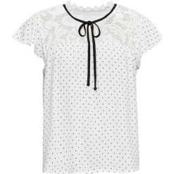 Shirt z koronką bonprix biel wełny - czarny w kropki. Białe koszulki damskie bonprix, w koronkowe wzory, z wełny, z kontrastowym kołnierzykiem, bez rękawów. Za 89,99 zł.