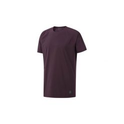 T-shirty z krótkim rękawem Reebok Sport Koszulka Training Supply Woven. Fioletowe koszulki męskie marki Reebok Sport, s, bez wzorów, sportowe, bez kołnierzyka, krótkie. Za 169,00 zł.