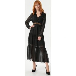 Czarna Sukienka Stacy. Czarne sukienki damskie Born2be, na co dzień, s, w paski, bez kołnierzyka, z długim rękawem, długie, mini, rozkloszowane. Za 129,99 zł.