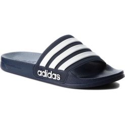 Klapki adidas - adilette Shower AQ1703 Conavy/Ftwwht/Conavy. Niebieskie klapki damskie Adidas, bez wzorów, z tworzywa sztucznego, bez obcasa. Za 99,95 zł.
