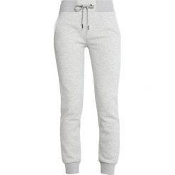 Peak Performance LOGO PANTS Spodnie treningowe medium grey melange. Szare spodnie damskie marki Peak Performance, m, bez wzorów, z bawełny, długie. Za 479,00 zł.