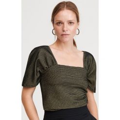 Bluzka z błyszczącą nitką - Czarny. Czarne bluzki damskie Reserved, s. W wyprzedaży za 19,99 zł.
