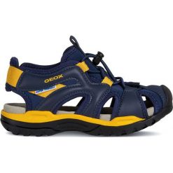 Geox - Sandały. Niebieskie sandały chłopięce Geox, z gumy, z okrągłym noskiem, bez zapięcia. W wyprzedaży za 199,90 zł.