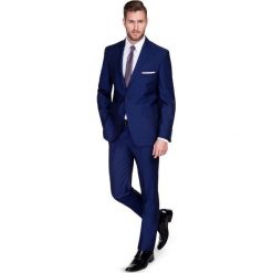 Garnitur CRISTIANO 1 E15-34P. Niebieskie garnitury Giacomo Conti, z tkaniny. Za 699,00 zł.