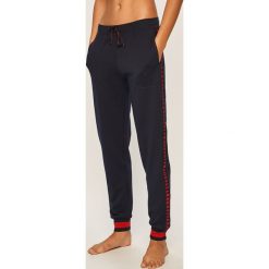 Dkny - Spodnie. Niebieskie spodnie damskie DKNY, s, z elastanu. W wyprzedaży za 249,90 zł.