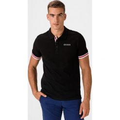 Guess Clancy Polo Koszulka Czarny. Czarne podkoszulki męskie Guess, m, z aplikacjami, z bawełny, polo, z krótkim rękawem, krótkie. Za 206,95 zł.
