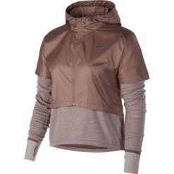 Bluza Nike Therma Long-Sleeve Top W Kremowo-Brązowa. Topy damskie Nike. Za 289,99 zł.
