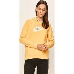 Nike Sportswear - Bluza. Żółte bluzy damskie Nike Sportswear, s, z nadrukiem, z bawełny, bez rękawów, z kapturem. W wyprzedaży za 179,90 zł.