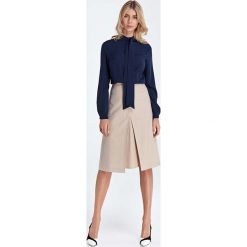 Beżowa Trapezowa Szykowna Spódnica z Kontrafałdą. Brązowe spódniczki damskie Molly.pl, do pracy, s, bez wzorów, eleganckie, trapezowe. Za 149,90 zł.