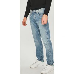 Calvin Klein Jeans - Jeansy CKJ 056. Niebieskie jeansy męskie marki Calvin Klein Jeans. Za 579,90 zł.