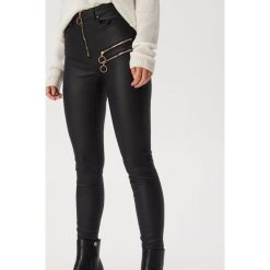 Spodnie skinny z ozdobnymi zamkami - Czarny. Czarne spodnie damskie Sinsay, s, bez wzorów. Za 79,99 zł.