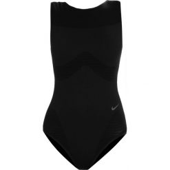 Nike Performance SEAMLESS STUDIO Koszulka sportowa black. Czarne bluzki sportowe damskie Nike Performance, s, z elastanu. Za 489,00 zł.
