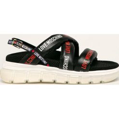 Love Moschino - Sandały. Czarne klapki damskie Love Moschino, bez wzorów, z gumy, bez obcasa, na obcasie. W wyprzedaży za 649,90 zł.