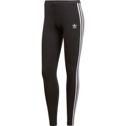 Spodnie adidas 3 stripes Tight (CE2441). Spodnie damskie Adidas, bez wzorów, z elastanu. Za 129,99 zł.