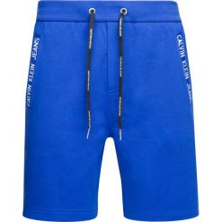 Szorty sportowe Calvin Klein Jeans J30J312553. Niebieskie spodenki sportowe męskie Calvin Klein Jeans, xl, bez wzorów, z bawełny, sportowe. W wyprzedaży za 199,00 zł.