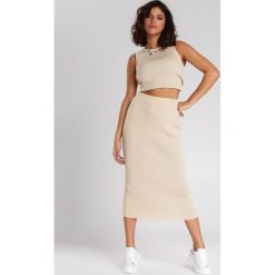 Jasnobeżowa Spódnica Ponce. Brązowe spódniczki damskie Renee, s, bez wzorów, z dzianiny, eleganckie, midi, ołówkowe. Za 99,99 zł.