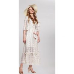 Beżowa Sukienka Adjective. Brązowe sukienki damskie other, s, z aplikacjami, boho, bez kołnierzyka, bez rękawów, maxi, dopasowane. Za 199,99 zł.