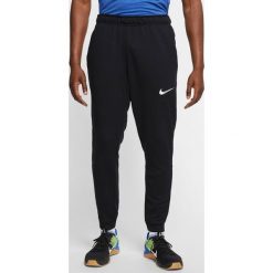 Nike Spodnie dresowe Czarny. Czarne spodnie męskie Nike, m, bez wzorów, z poliesteru. Za 171,95 zł.