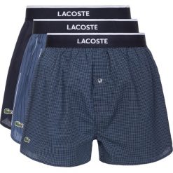 Lacoste Bokserki 3szt Niebieski. Niebieskie bokserki męskie Lacoste, bez wzorów, z bawełny. Za 223,95 zł.