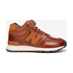 New Balance 574 Tenisówki Brązowy. Pomarańczowe trampki męskie New Balance, bez wzorów, ze skóry, bez zapięcia. Za 516,95 zł.