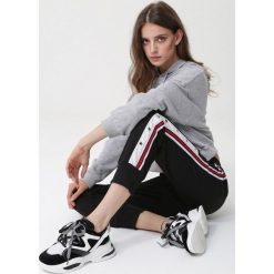 Czarne Spodnie Stonyfell. Czarne spodnie damskie Born2be, s, z dresówki. Za 49,99 zł.