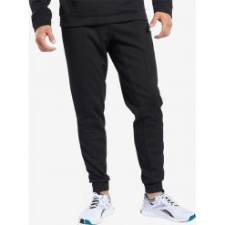 Reebok Workout Ready Spodnie dresowe Czarny. Czarne spodnie męskie Reebok, m, bez wzorów, z poliesteru. Za 197,95 zł.