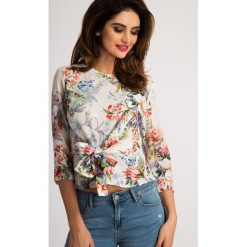 Kremowa Bluzka Floral 21111. Białe bluzki damskie marki Fasardi, s, bez wzorów, bez kołnierzyka, bez rękawów. Za 59,00 zł.
