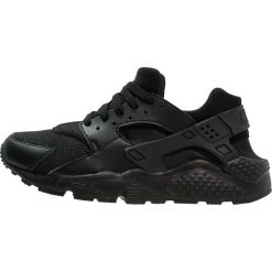 Nike Sportswear HUARACHE RUN Tenisówki i Trampki black. Czarne trampki dziewczęce Nike Sportswear, z tworzywa sztucznego. W wyprzedaży za 319,20 zł.