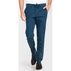 Jack & Jones Marco Spodnie Niebieski. Niebieskie spodnie męskie Jack & Jones, bez wzorów, z elastanu. Za 268,95 zł.