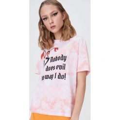 Koszulka tie dye Atomówki - Różowy. Różowe koszulki damskie Sinsay, s, bez wzorów, bez kołnierzyka, bez rękawów. Za 39,99 zł.