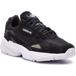 Buty adidas - Falcon W B28129 Cblack/Cblack/Ftwwht. Czarne buty sportowe damskie Adidas, bez wzorów, z zamszu, sportowe. Za 399,00 zł.