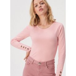 Bawełniana bluzka z guzikami - Różowy. Różowe bluzki damskie Sinsay, s, bez wzorów, z bawełny, bez kołnierzyka, bez rękawów. Za 24,99 zł.