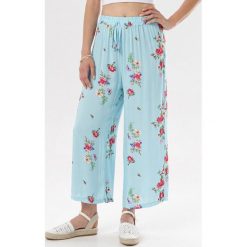 Jasnoniebieskie Spodnie Echorise. Niebieskie spodnie damskie Born2be, xl, z tkaniny. W wyprzedaży za 29,99 zł.