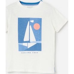 Bawełniany t-shirt z nadrukiem - Kremowy. Białe t-shirty damskie Reserved, m, z nadrukiem, z bawełny, bez kołnierzyka. W wyprzedaży za 19,99 zł.