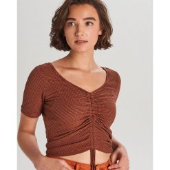 Top ze ściągaczem - Brązowy. Pomarańczowe topy damskie Cropp, s, bez wzorów, bez kołnierzyka. W wyprzedaży za 19,99 zł.