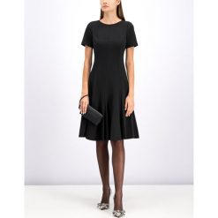 Sukienka koktajlowa Calvin Klein K20K201516. Czarne sukienki damskie Calvin Klein, bez wzorów, z elastanu, wizytowe, bez kołnierzyka, bez rękawów. W wyprzedaży za 409,00 zł.