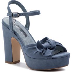 Sandały XTI - 32074 Jeans. Niebieskie klapki damskie Xti, bez wzorów, z jeansu, bez obcasa, na obcasie. W wyprzedaży za 159,00 zł.