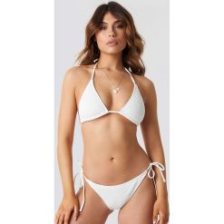 NA-KD Swimwear Smocked Triangle Bikini Panty - White. Białe panty damskie marki NA-KD Swimwear, bez wzorów. Za 80,95 zł.