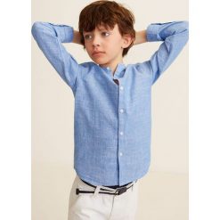 Mango Kids - Koszula dziecięca George 110-164 cm. Niebieskie koszule chłopięce marki Mango Kids, bez wzorów, z bawełny, casualowe, ze stójką, z długim rękawem, długie. Za 79,90 zł.