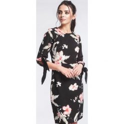 Czarna Sukienka Brood Over. Czarne sukienki damskie other, xl, w kwiaty, bez kołnierzyka, bez rękawów, midi. Za 89,99 zł.