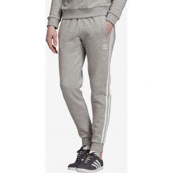 Adidas Originals Spodnie dresowe Szary. Szare spodnie męskie adidas Originals, s, bez wzorów, z bawełny. Za 254,95 zł.
