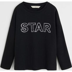 Mango Kids - Longsleeve dziecięcy Star 110-164 cm. Czarne bluzki dziewczęce Mango Kids, z aplikacjami, z bawełny, z okrągłym kołnierzem, z długim rękawem, długie, bez kaptura. Za 59,90 zł.