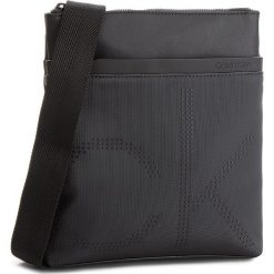 Saszetka CALVIN KLEIN - Ck Poit Flat Crosso K50K503877 001. Czarne sandały męskie marki Calvin Klein, z materiału, młodzieżowe. W wyprzedaży za 279,00 zł.