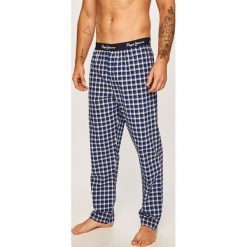 Pepe Jeans - Spodnie piżamowe Kyle. Niebieskie piżamy męskie Pepe Jeans, na co dzień, xl, bez wzorów, z bawełny. W wyprzedaży za 129,90 zł.