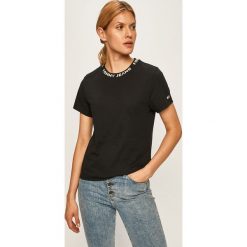 Tommy Jeans - T-shirt. Czarne bluzki damskie Tommy Jeans, s, bez wzorów, z bawełny, casualowe, z okrągłym kołnierzem. W wyprzedaży za 139,90 zł.