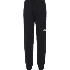 Spodnie dresowe The North Face NSE T94SVQJK3. Czarne spodnie męskie The North Face, l, bez wzorów, z dresówki. Za 273,99 zł.